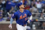 New York Mets' Pete Alonso hits a home run off Chicago Cubs starting pitcher Jameson Taillon in New York